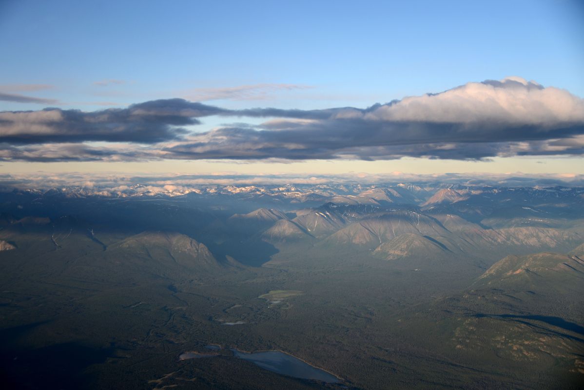 18 Green Hills Leading To Snow Capped Mountains Just Before Landing At Whitehorse Yukon